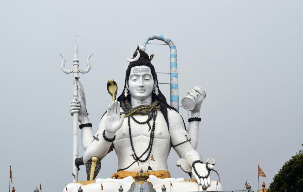 Impressive statue of Lord Shiva against a clear sky in Gangtok, Sikkim, India.